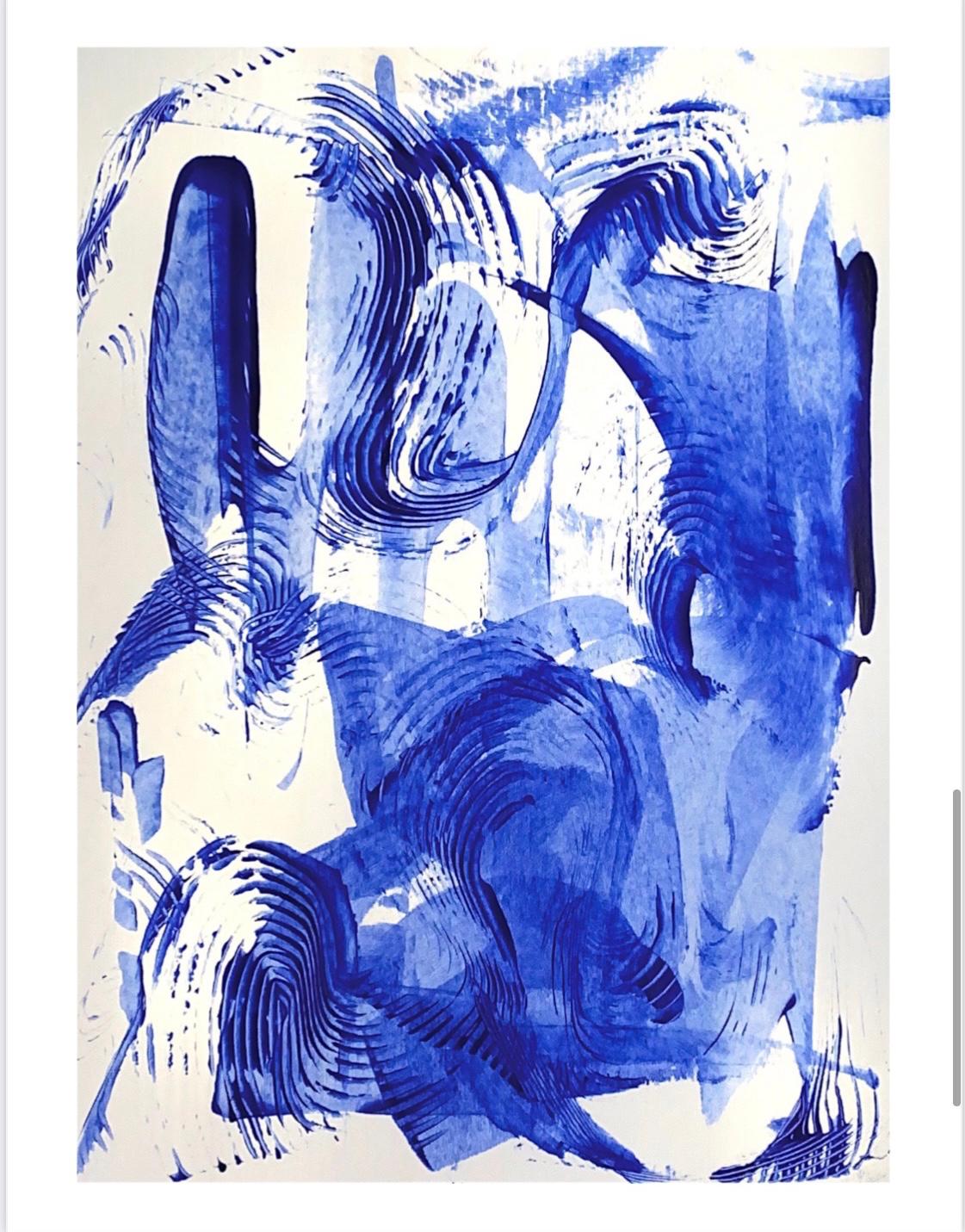 Sweeping combed blue strokes on paper
