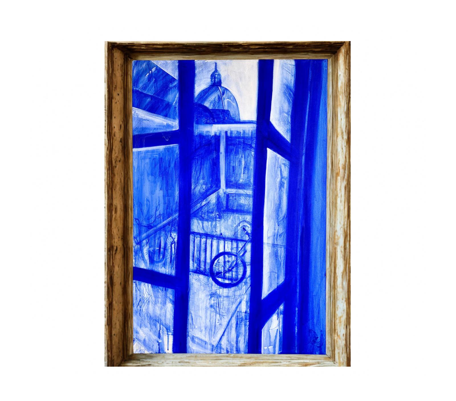 Blue view through tall window frames toward a domed building