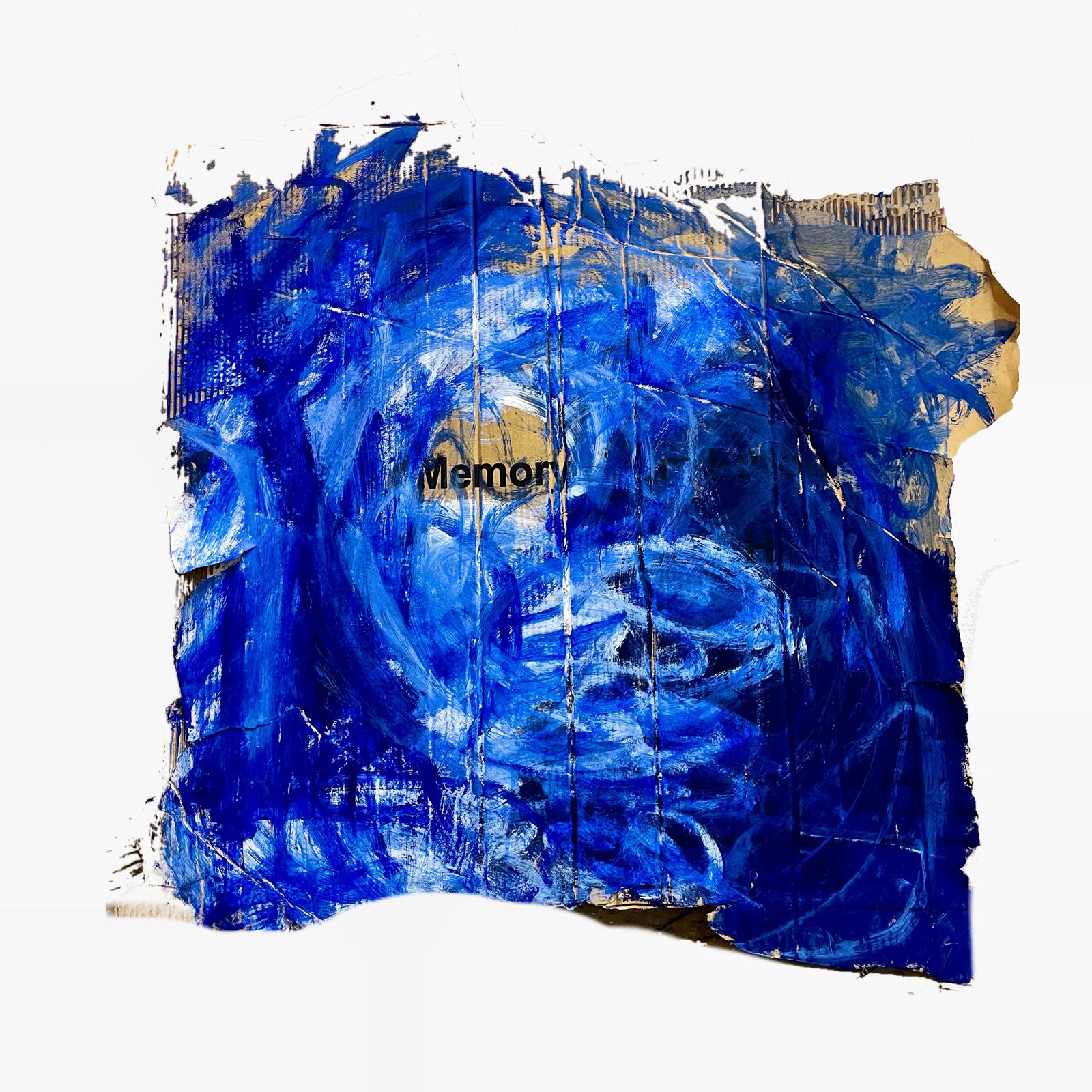 Textured blue collage on torn paper with the word Memory