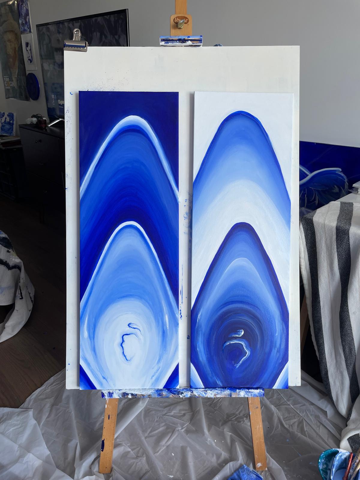 Diptych of blue agate-like arches on an easel