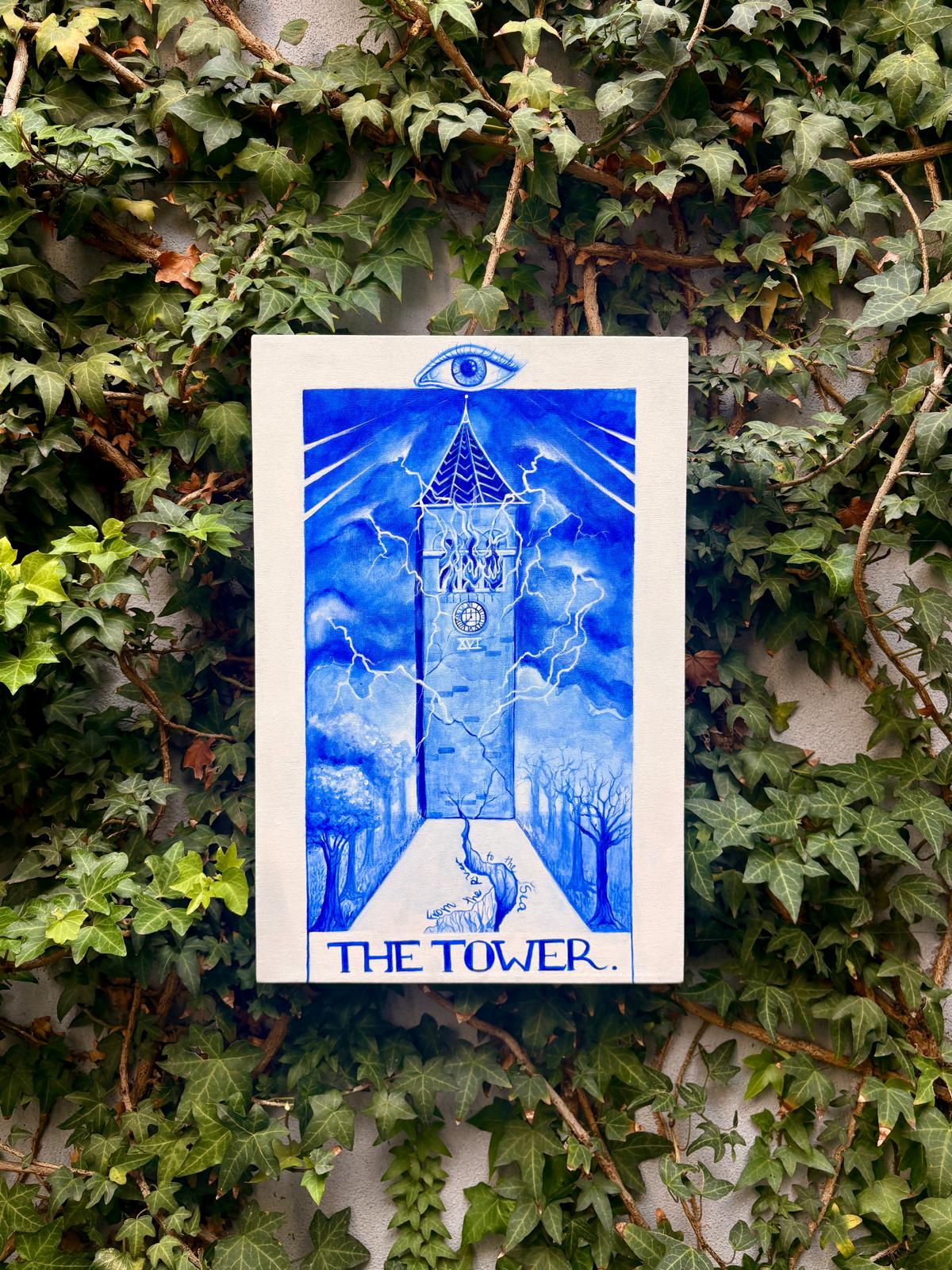 Blue tarot-style painting of a tower beneath an eye, lettered The Tower