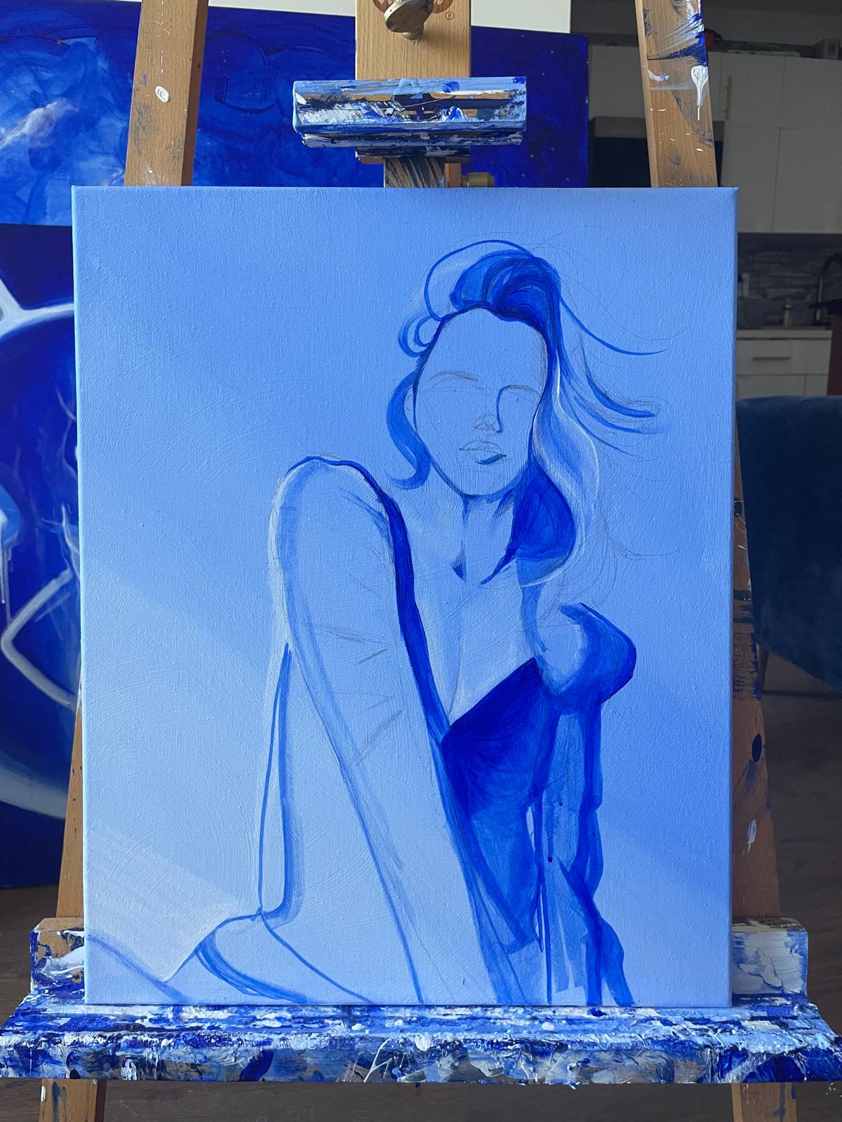 Blue line portrait of a woman on an easel
